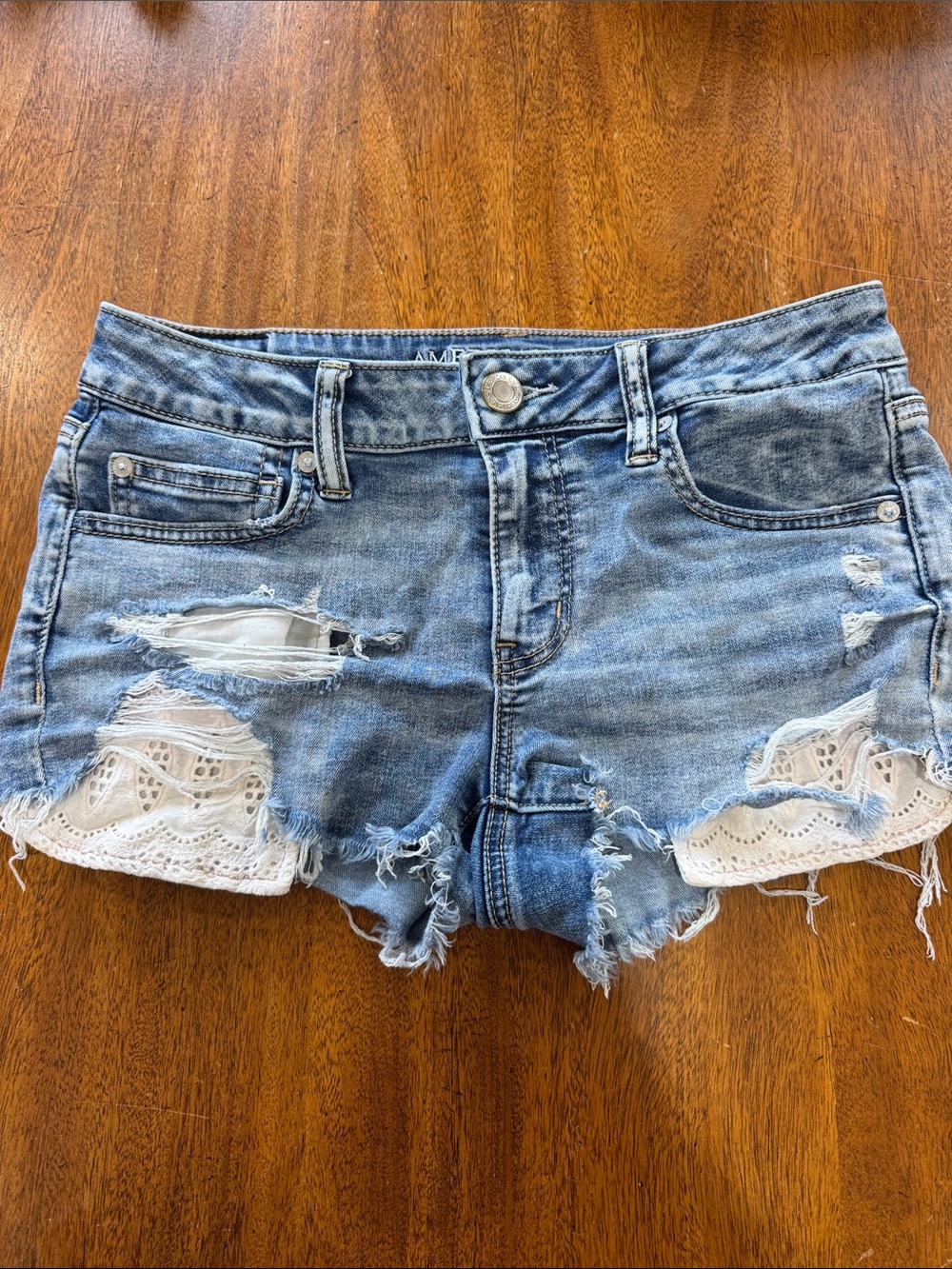 American Eagle Outfitters Light Blue Distressed Denim Shorts with White Lace - Picture 1 of 1